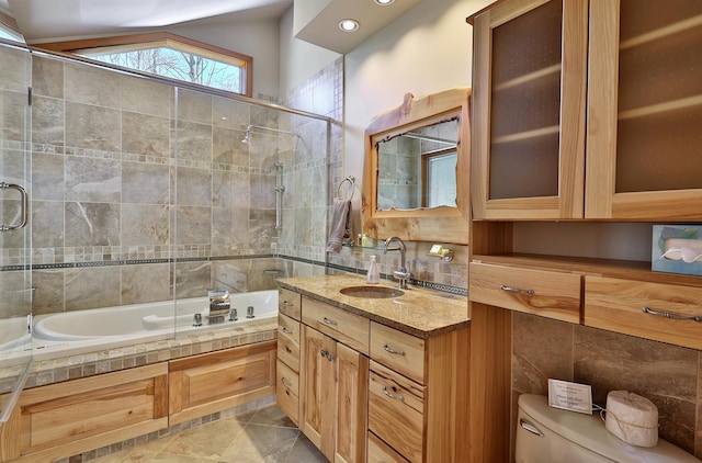 full bathroom featuring oversized vanity, bath / shower combo with glass door, toilet, tile floors, and vaulted ceiling