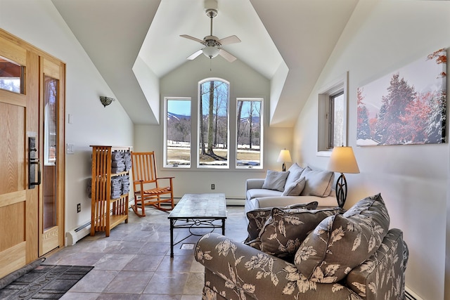 interior space featuring vaulted ceiling, ceiling fan, and baseboard heating