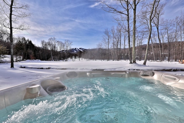 view of snow covered pool