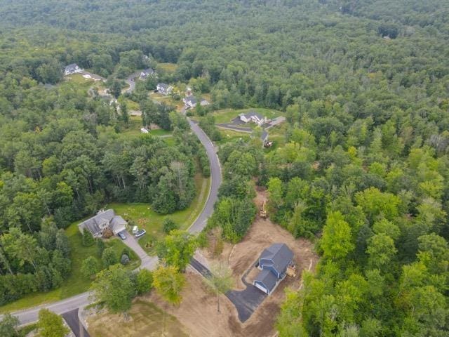 11 Hickorywood Cir Lot 60, Meredith, NH 03253 - aerial view of property's location featuring a heavily wooded area