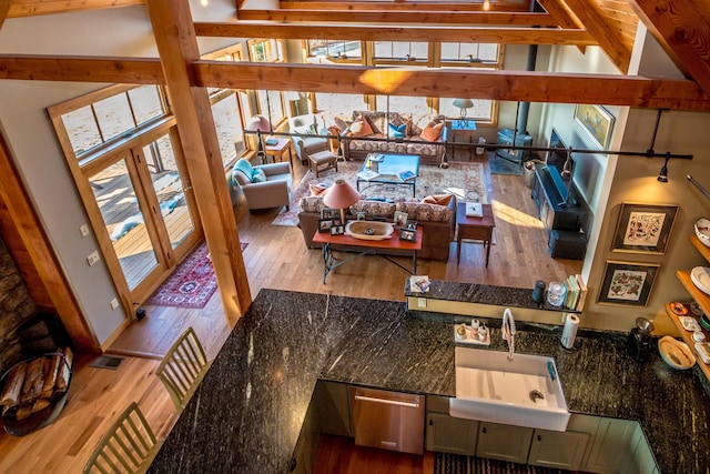 living room with sink and hardwood / wood-style floors