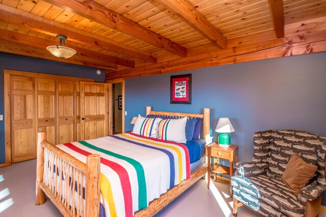 carpeted bedroom featuring wooden ceiling and beam ceiling