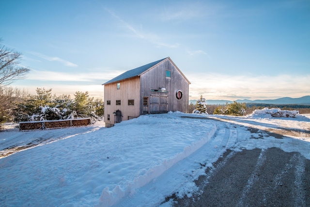 exterior space featuring a mountain view