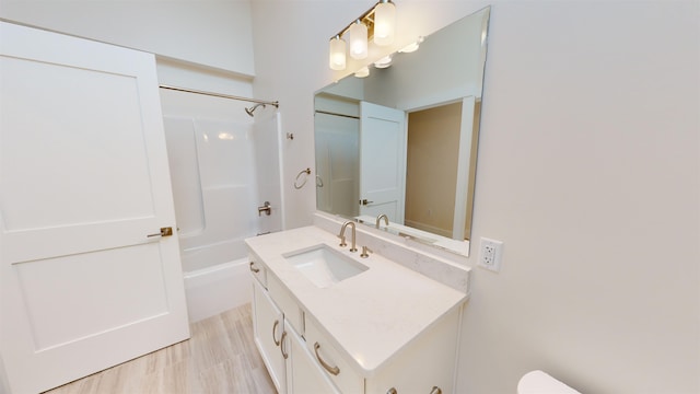 full bathroom featuring vanity, shower / washtub combination, and toilet