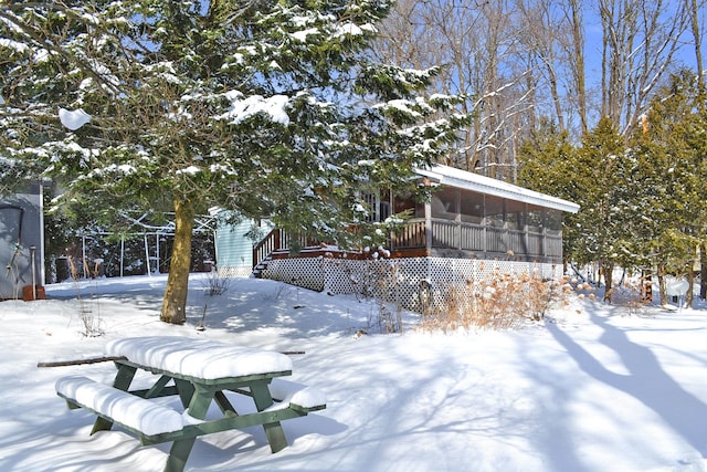 view of snow covered patio