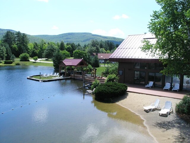 exterior space with a gazebo and a mountain view