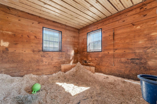203 Kingston Rd, Danville, NH 03819 - interior space featuring wooden walls and carpet floors
