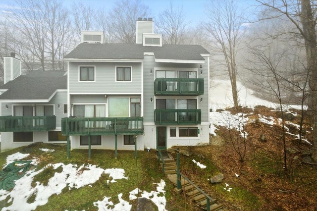 view of snow covered property