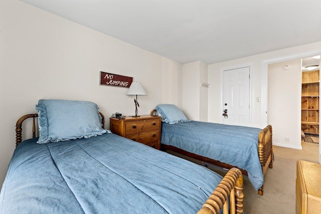 bedroom featuring carpet