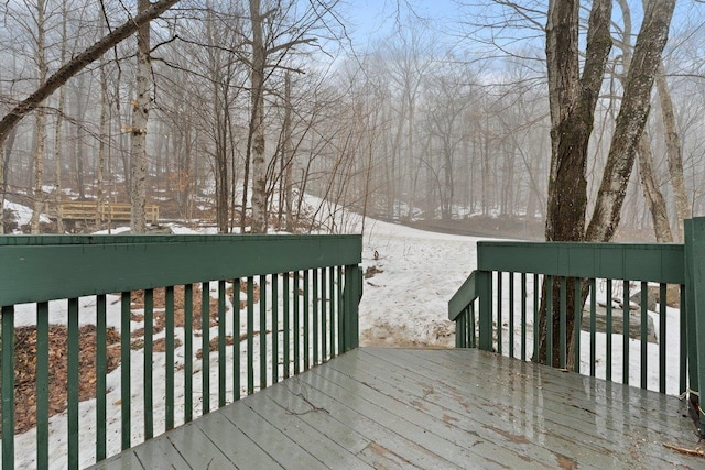 view of snow covered deck