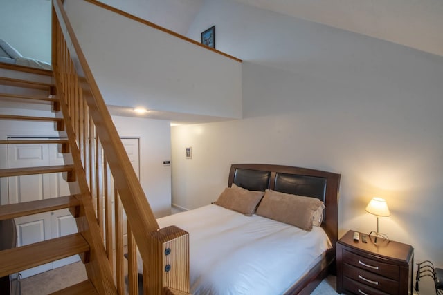 bedroom with a towering ceiling