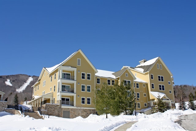 view of snow covered building