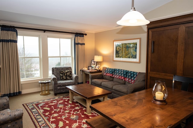 carpeted living room with lofted ceiling