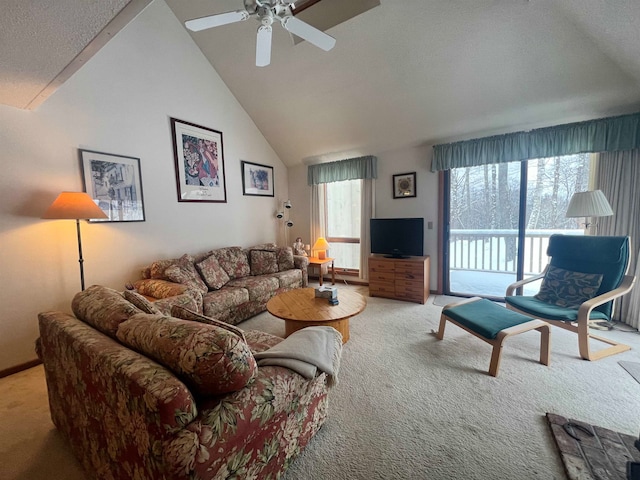 living room featuring light carpet, high vaulted ceiling, and ceiling fan