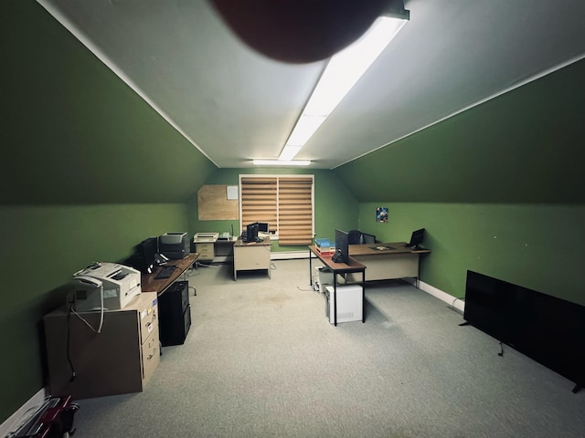 additional living space featuring carpet flooring and lofted ceiling