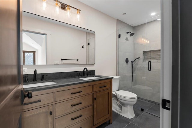 bathroom featuring vanity, toilet, tile patterned floors, and walk in shower