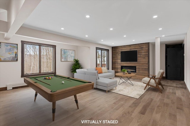 game room with baseboard heating, light hardwood / wood-style flooring, billiards, and plenty of natural light