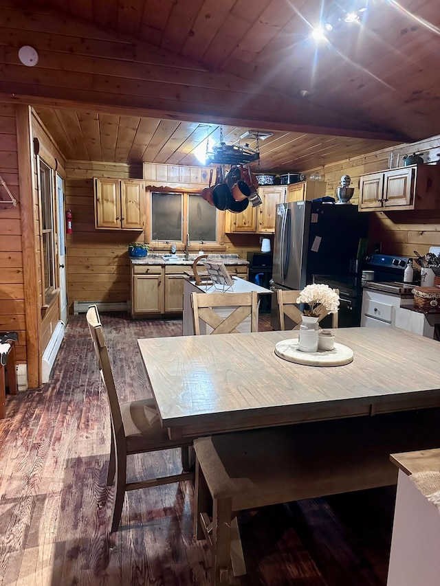 17 Tracy Hill Rd, Northfield, VT 05663 - dining area featuring wooden ceiling, dark wood finished floors, a baseboard heating unit, and wood walls