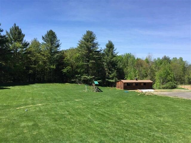 17 Tracy Hill Rd, Northfield, VT 05663 - view of green lawn with a forest view