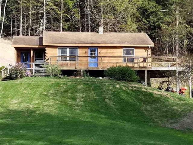 17 Tracy Hill Rd, Northfield, VT 05663 - view of front facade with a front lawn and a deck