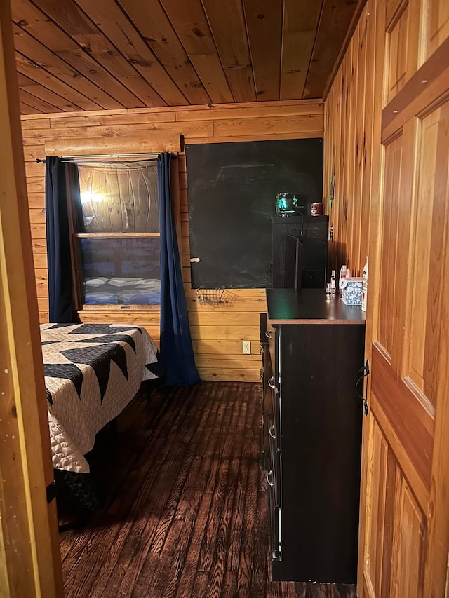 17 Tracy Hill Rd, Northfield, VT 05663 - bedroom with wooden walls, dark wood-style floors, and wood ceiling