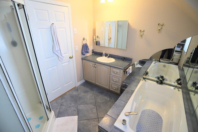 bathroom with vanity, tile patterned floors, and independent shower and bath