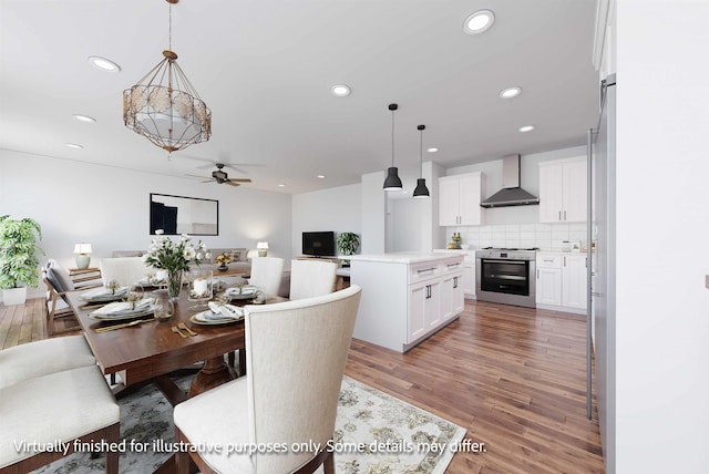 dining room featuring hardwood / wood-style floors and ceiling fan