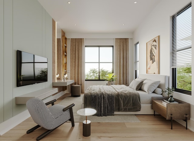 bedroom with light wood-type flooring