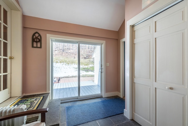 entryway with vaulted ceiling