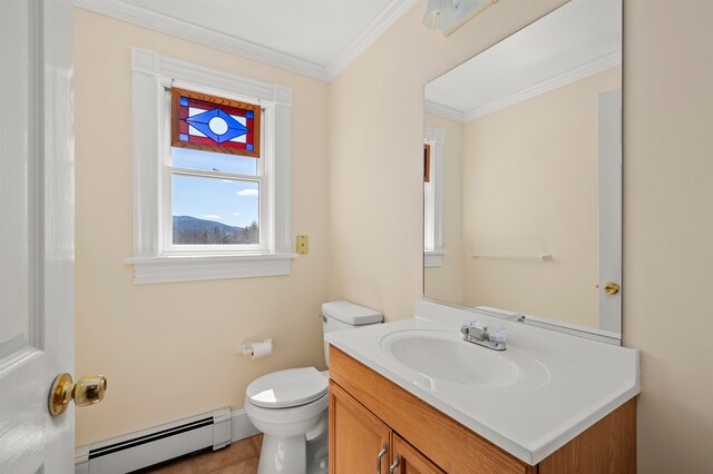 bathroom featuring tile flooring, crown molding, vanity, toilet, and a baseboard radiator