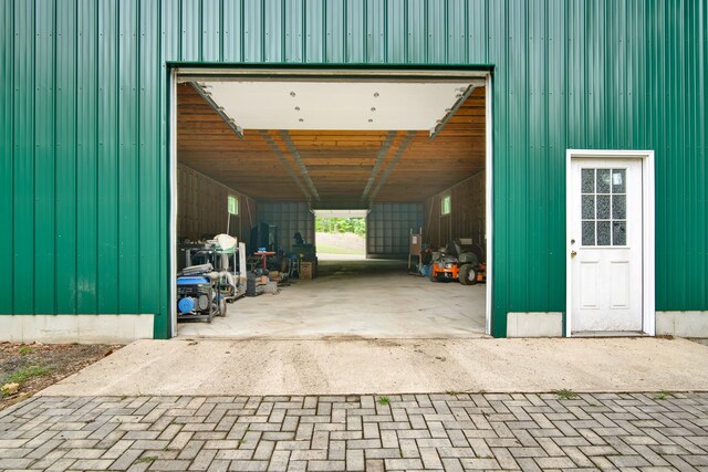 garage featuring a carport