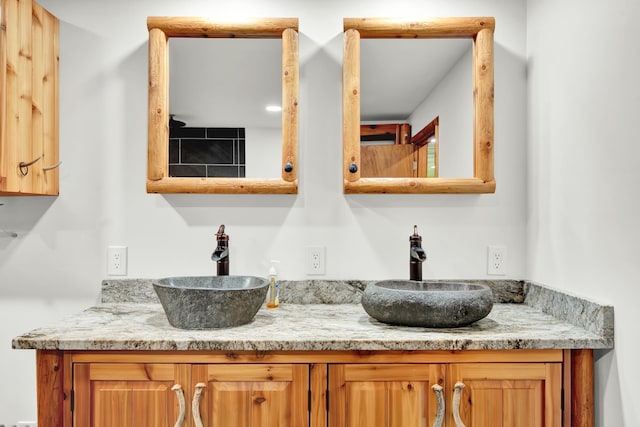 bathroom featuring double sink and oversized vanity