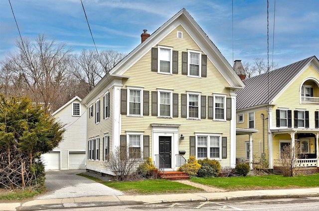 view of front of property with a garage