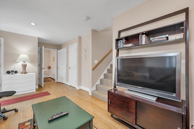 living room with light hardwood / wood-style floors