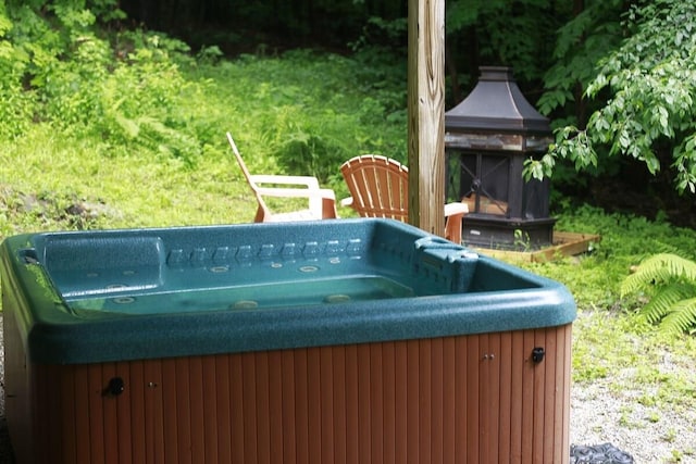 view of pool featuring a hot tub