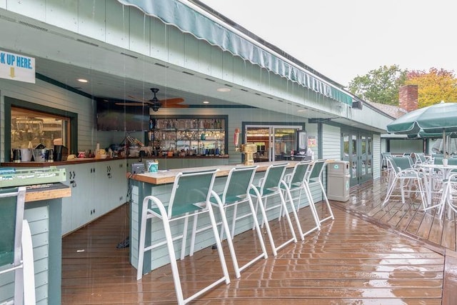 wooden deck with ceiling fan