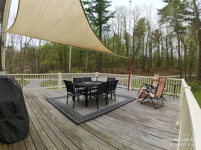 wooden deck with area for grilling