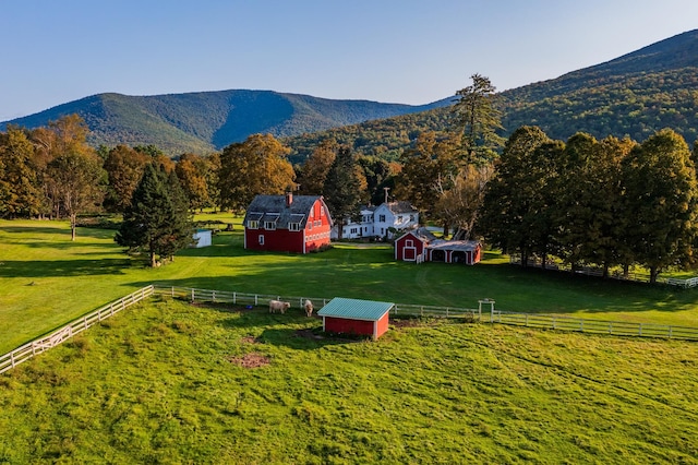 view of mountain feature with a rural view