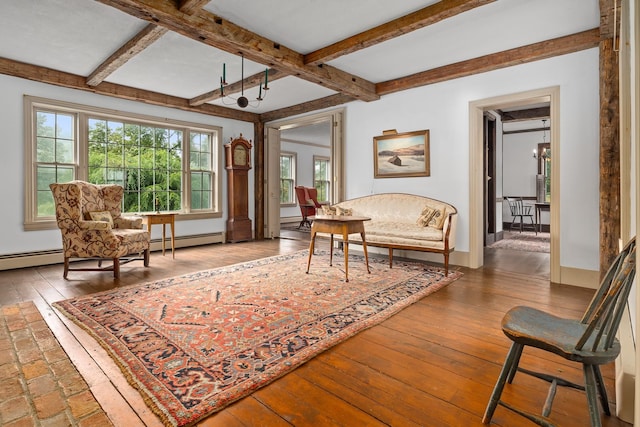 living area with hardwood / wood-style floors, beamed ceiling, and a baseboard radiator