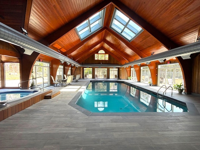 view of pool with a skylight