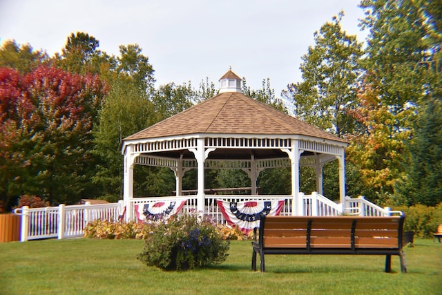 view of home's community with a yard and a gazebo