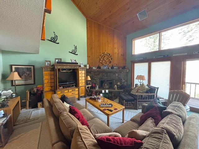 living room with wooden ceiling, light carpet, high vaulted ceiling, and wood walls