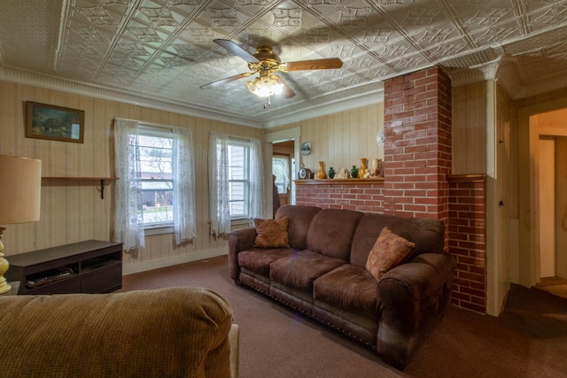 carpeted living room featuring crown molding and ceiling fan