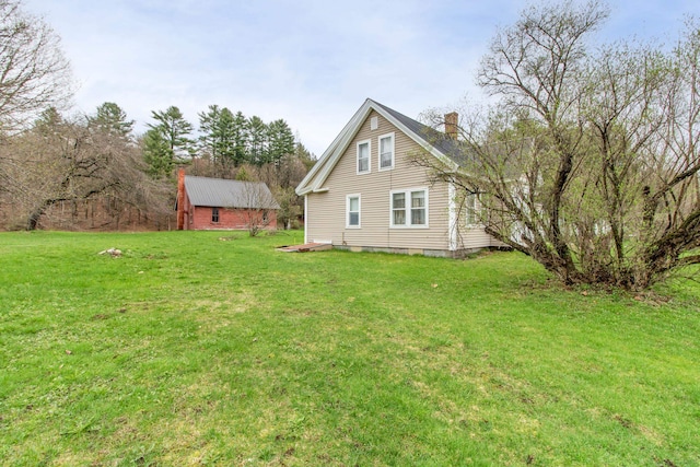 exterior space featuring a lawn