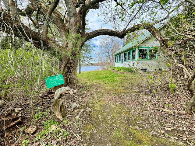 view of yard with a water view