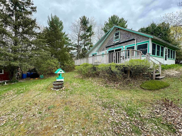 view of yard with a deck