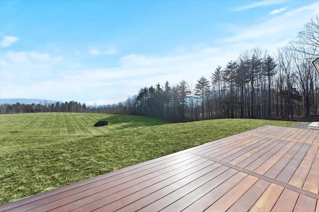 wooden deck with a yard
