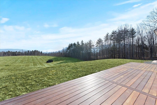 deck featuring a yard