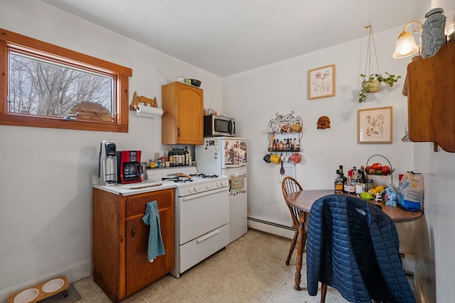 kitchen featuring white appliances, a baseboard heating unit, and light tile floors