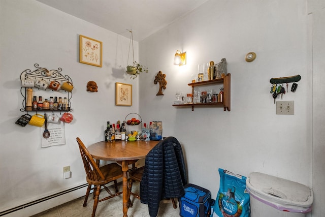 dining room with a baseboard radiator